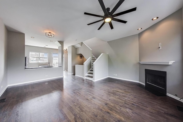 7501 Brown Ave Unit 3C, Forest Park, IL 60130 - unfurnished living room with ceiling fan, wood finished floors, stairway, a fireplace with flush hearth, and recessed lighting