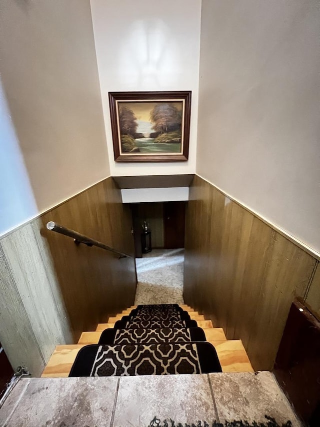 3506 N Rutherford Ave, Chicago, IL 60634 - stairs featuring a wainscoted wall, wooden walls, and carpet floors