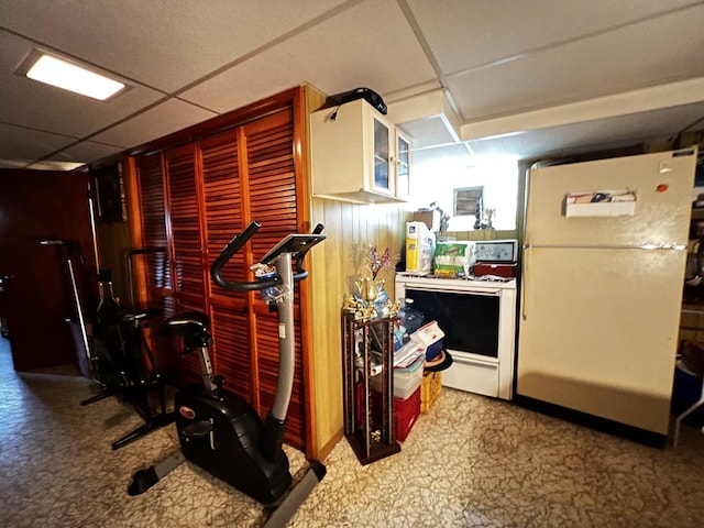 3506 N Rutherford Ave, Chicago, IL 60634 - finished basement featuring freestanding refrigerator and a paneled ceiling