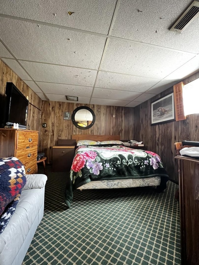 3506 N Rutherford Ave, Chicago, IL 60634 - bedroom with carpet, wood walls, and a paneled ceiling