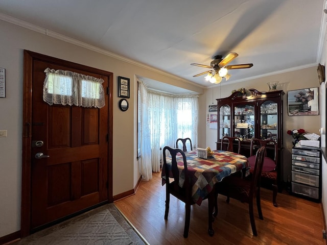 3506 N Rutherford Ave, Chicago, IL 60634 - dining space featuring crown molding, light wood finished floors, and ceiling fan