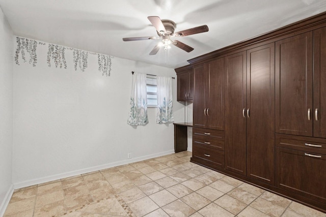 9445 W Kelvin Ln Unit 2992, Schiller Park, IL 60176 - unfurnished bedroom with built in study area and ceiling fan