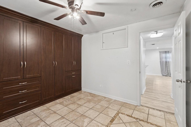 9445 W Kelvin Ln Unit 2992, Schiller Park, IL 60176 - unfurnished bedroom featuring light tile patterned floors and ceiling fan