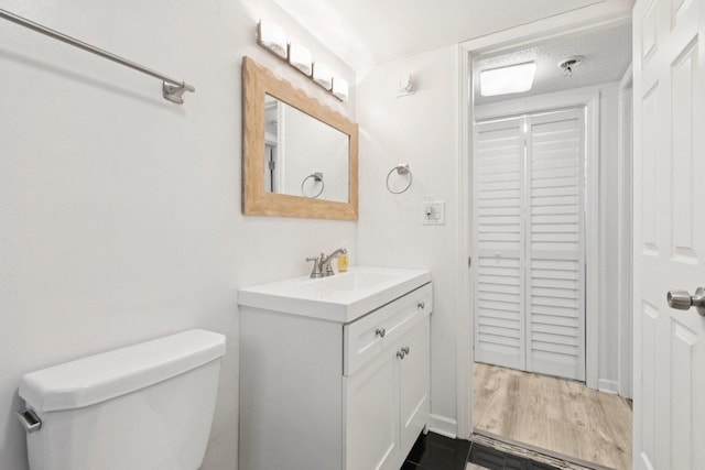 9445 W Kelvin Ln Unit 2992, Schiller Park, IL 60176 - bathroom featuring vanity and wood finished floors