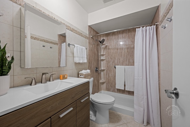 29W440 Emerald Green Dr Unit 25-F, Warrenville, IL 60555 - full bath featuring tile walls, vanity, tiled shower, tile patterned flooring, and tasteful backsplash