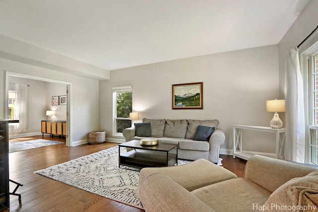 232 Bobolink Dr, Grayslake, IL 60030 - living room featuring dark wood-style floors and baseboards