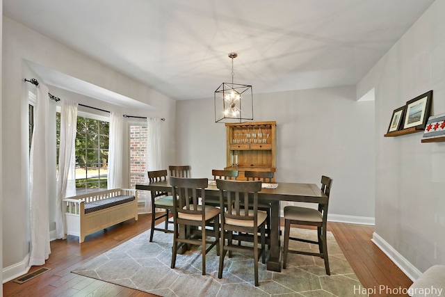 232 Bobolink Dr, Grayslake, IL 60030 - dining room with hardwood / wood-style floors and a chandelier