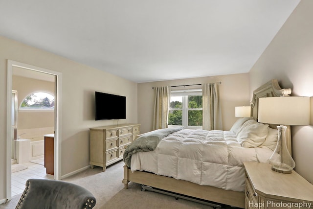 232 Bobolink Dr, Grayslake, IL 60030 - bedroom featuring multiple windows, light colored carpet, and ensuite bathroom