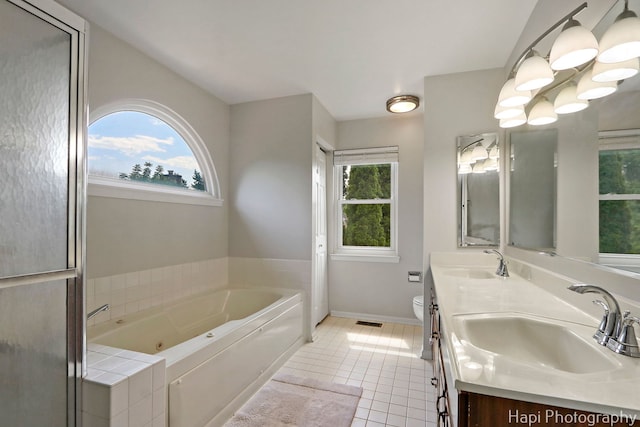 232 Bobolink Dr, Grayslake, IL 60030 - bathroom featuring a whirlpool tub, double vanity, and tile patterned floors