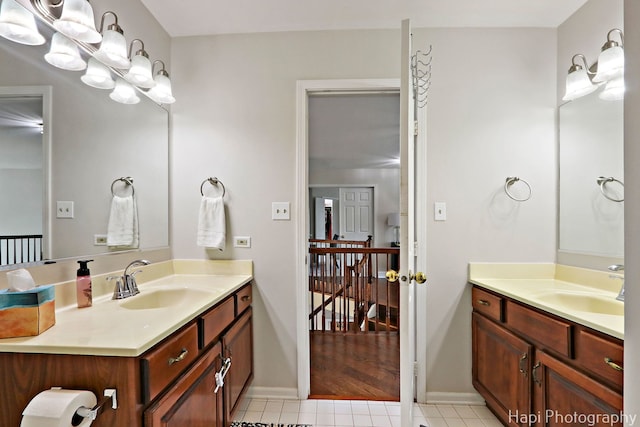 232 Bobolink Dr, Grayslake, IL 60030 - bathroom featuring two vanities and tile patterned floors