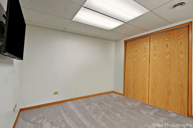 232 Bobolink Dr, Grayslake, IL 60030 - unfurnished bedroom featuring carpet floors, a drop ceiling, and a closet