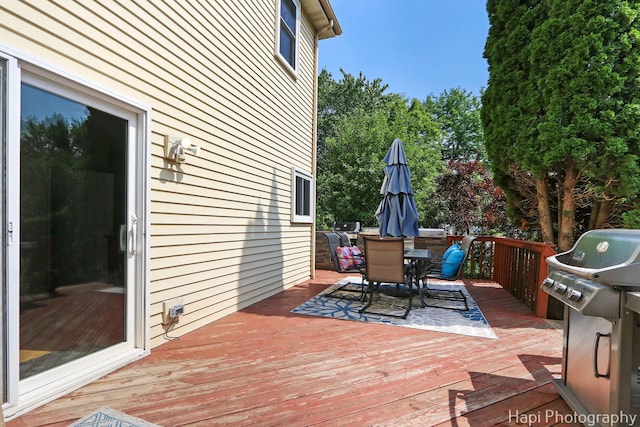 232 Bobolink Dr, Grayslake, IL 60030 - deck with a grill and outdoor dining space