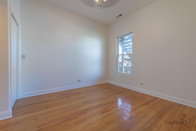 2318 S Central Park Ave Unit 101, Chicago, IL 60623 - spare room with ceiling fan and light wood-type flooring