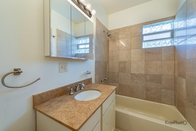2318 S Central Park Ave Unit 101, Chicago, IL 60623 - full bath with healthy amount of natural light, shower / bath combination, and vanity