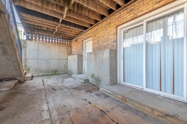 2318 S Central Park Ave Unit 101, Chicago, IL 60623 - view of patio featuring an exterior structure