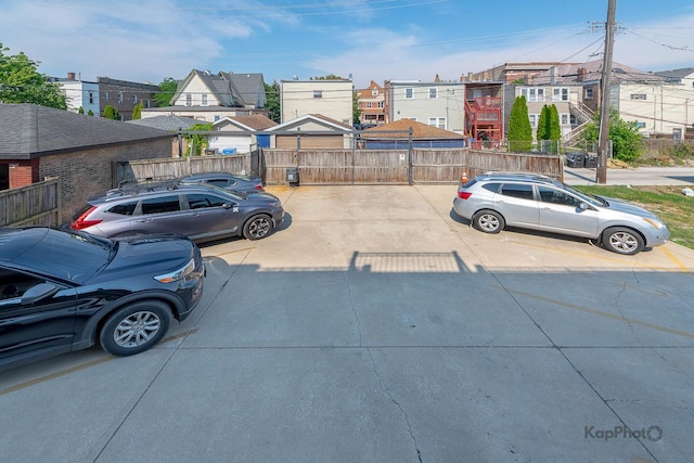 2318 S Central Park Ave Unit 101, Chicago, IL 60623 - view of car parking with a residential view
