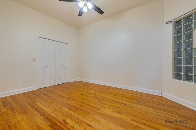 2318 S Central Park Ave Unit 101, Chicago, IL 60623 - unfurnished bedroom featuring light wood-type flooring, a closet, and a ceiling fan