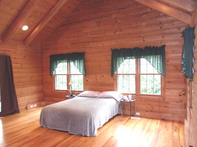 26901 W Burkhart Ln, Ingleside, IL 60041 - bedroom with light wood finished floors, wood walls, and wooden ceiling