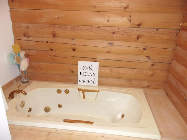 26901 W Burkhart Ln, Ingleside, IL 60041 - full bathroom with a jetted tub and wood walls