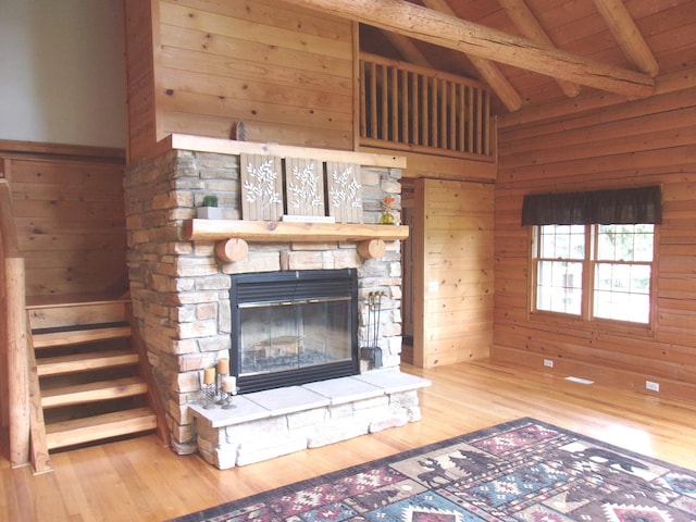 26901 W Burkhart Ln, Ingleside, IL 60041 - unfurnished living room featuring wood finished floors, a fireplace, wood ceiling, and wood walls