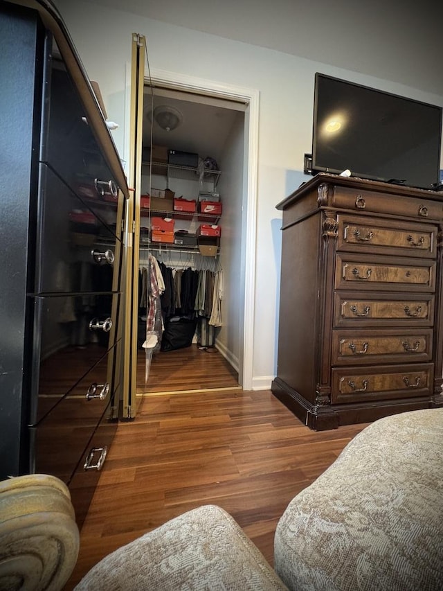 8513 S Sangamon St, Chicago, IL 60620 - bedroom featuring wood finished floors and a walk in closet