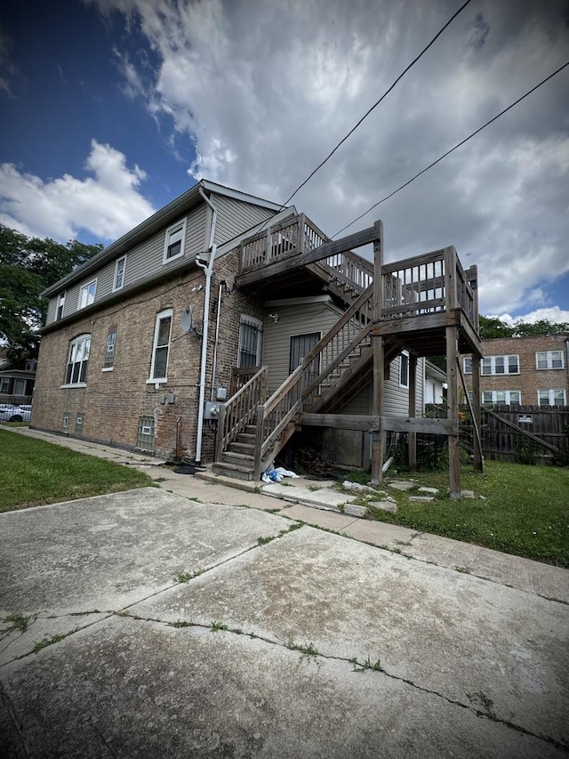 8513 S Sangamon St, Chicago, IL 60620 - rear view of property with stairway and a deck