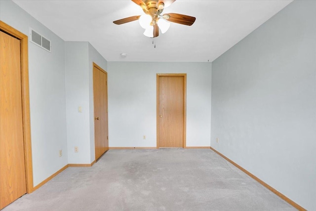 390 Madeline Trl, Rockford, IL 61107 - unfurnished bedroom featuring carpet and ceiling fan