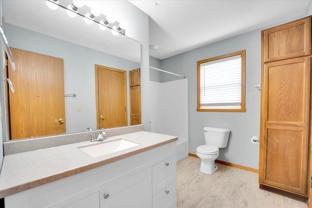 390 Madeline Trl, Rockford, IL 61107 - bathroom featuring vanity, bathing tub / shower combination, and wood finished floors