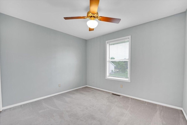390 Madeline Trl, Rockford, IL 61107 - carpeted spare room featuring baseboards and a ceiling fan