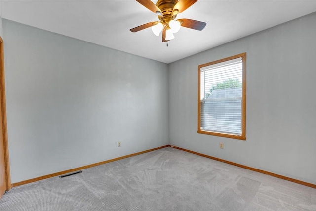 390 Madeline Trl, Rockford, IL 61107 - spare room featuring light colored carpet and ceiling fan