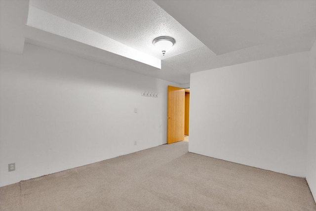 390 Madeline Trl, Rockford, IL 61107 - carpeted empty room with a textured ceiling