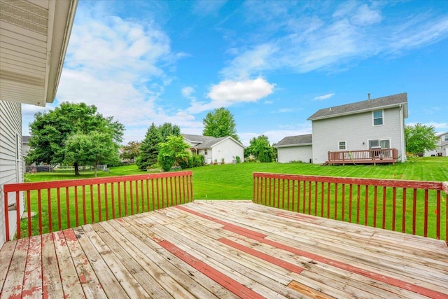 390 Madeline Trl, Rockford, IL 61107 - wooden terrace featuring a lawn and a residential view