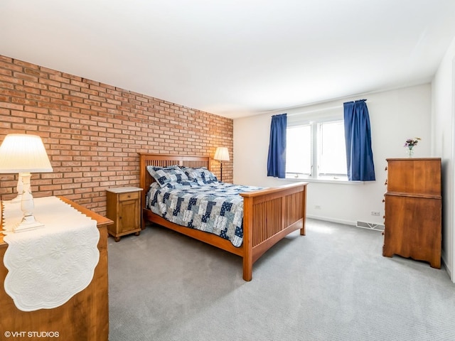 534 E Main St, Barrington, IL 60010 - bedroom with brick wall and carpet floors