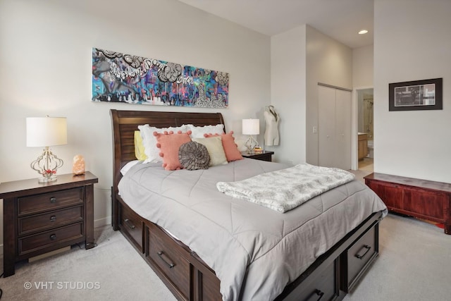 4011 N Francisco Ave Unit 310, Chicago, IL 60618 - bedroom featuring light carpet, recessed lighting, a closet, and ensuite bath