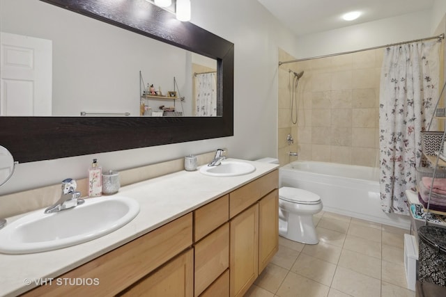 4011 N Francisco Ave Unit 310, Chicago, IL 60618 - bathroom featuring shower / bath combo with shower curtain, double vanity, and tile patterned floors