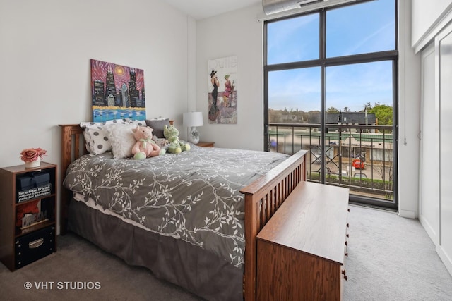 4011 N Francisco Ave Unit 310, Chicago, IL 60618 - bedroom featuring carpet floors and access to exterior
