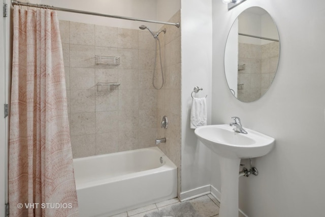 4011 N Francisco Ave Unit 310, Chicago, IL 60618 - bathroom featuring shower / bathtub combination with curtain and tile patterned floors