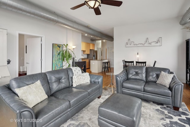 4011 N Francisco Ave Unit 310, Chicago, IL 60618 - living area featuring light wood-type flooring and ceiling fan