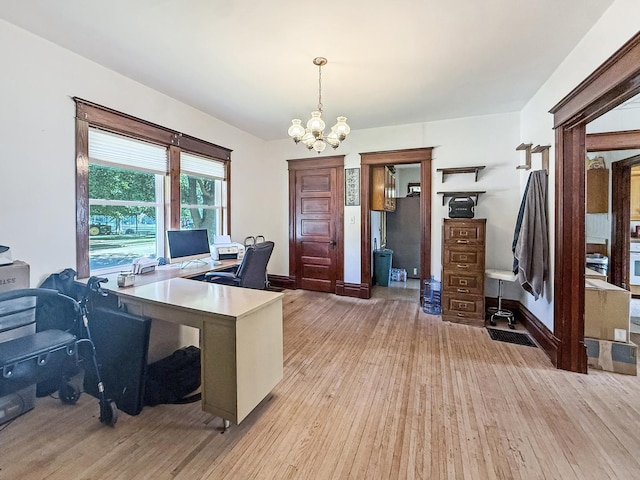 401 S Chestnut St, Shannon, IL 61078 - home office with a chandelier and light wood finished floors