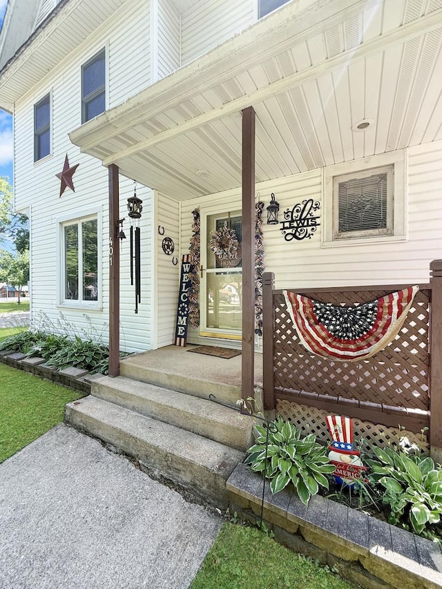 401 S Chestnut St, Shannon, IL 61078 - doorway to property featuring covered porch