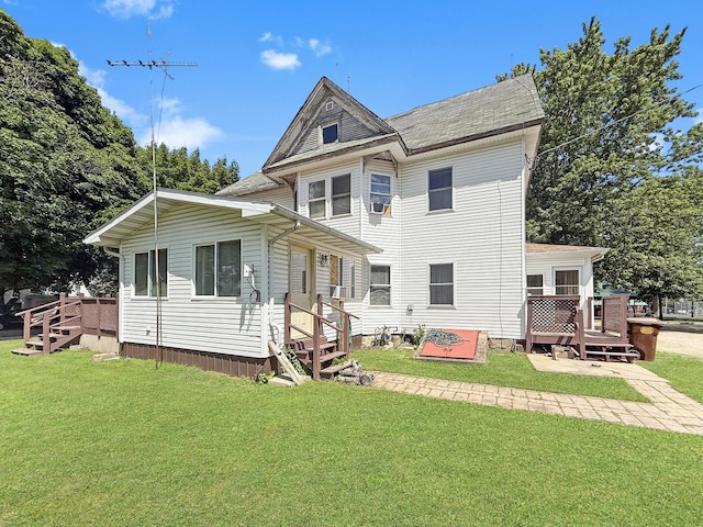 401 S Chestnut St, Shannon, IL 61078 - back of house featuring a deck and a yard
