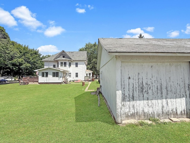 401 S Chestnut St, Shannon, IL 61078 - rear view of house featuring a yard