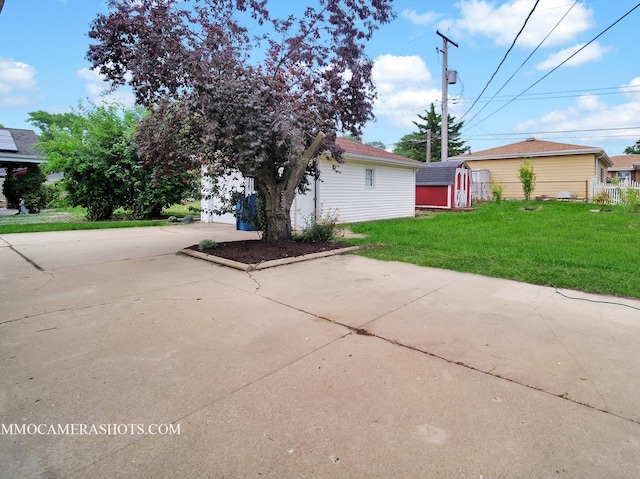513 Chaney Ave, Crest Hill, IL 60403 - view of side of property featuring a shed and concrete driveway