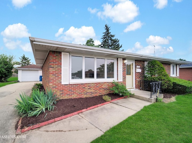 513 Chaney Ave, Crest Hill, IL 60403 - ranch-style home with brick siding, a garage, and a front yard