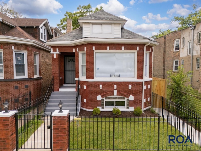 7253 S Marshfield Ave, Chicago, IL 60636 - view of front facade featuring brick siding, a fenced front yard, roof with shingles, and a gate