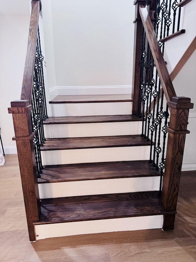 7253 S Marshfield Ave, Chicago, IL 60636 - staircase featuring wood finished floors and baseboards