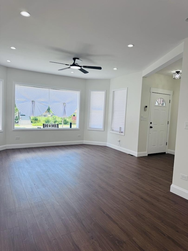 7253 S Marshfield Ave, Chicago, IL 60636 - unfurnished living room featuring dark wood finished floors, a ceiling fan, plenty of natural light, and recessed lighting