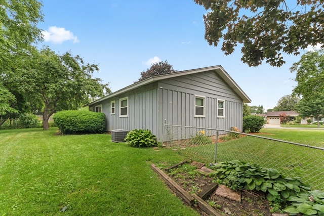 57 Kenilworth Ave, Elk Grove Village, IL 60007 - view of side of home with board and batten siding and a cooling unit