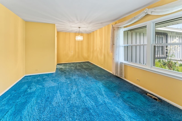 57 Kenilworth Ave, Elk Grove Village, IL 60007 - carpeted spare room with a chandelier and baseboards