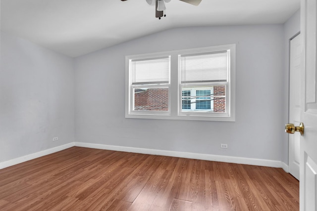2059 Pine St Unit D, Des Plaines, IL 60018 - spare room featuring a ceiling fan, wood finished floors, and vaulted ceiling